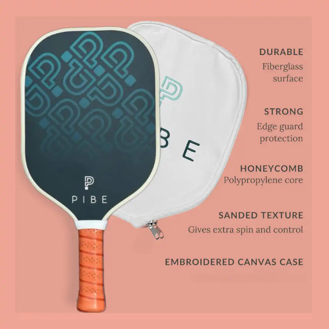 Pickleball paddle with text highlighting features on a pink background